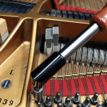 A Plumber With Clean Hands: Tinkling (The Ivories) With Piano Tuner Isaac Wynn