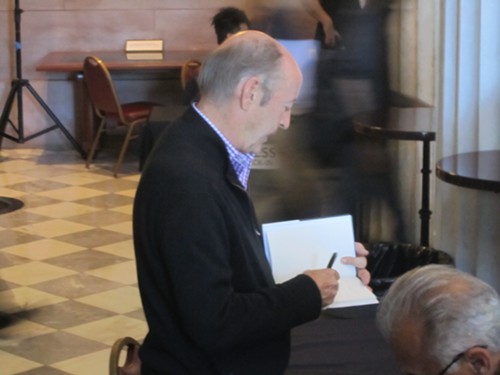 Billy Collins. This is from the Book Fest and was snapped by one Henry Stewart. It is not photoshopped. This is simpley Mr. Stewarts unique style.