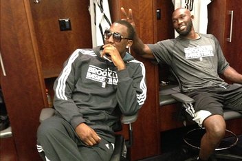 Andray Blatche and Reggie Evans in the Nets locker room.