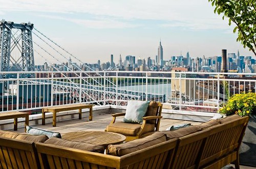 I dont care about Lena Dunham living here, but I do care about me living here. Thats an amazing roof deck.