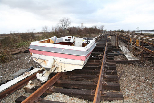 Boat-washed-across-Tracks-MTA-A-Train-Rockaway-Line-hurricane-sandy-e1361566981239.jpg