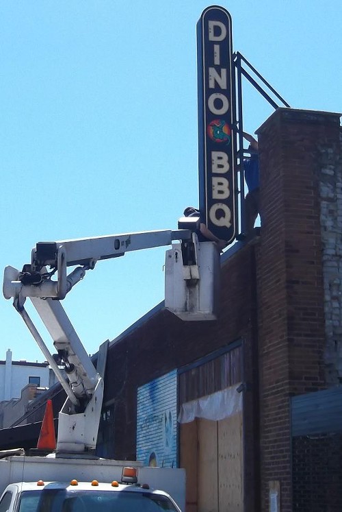 Sign being put up at Gowanus Location Sign being put up at Gowanus Location