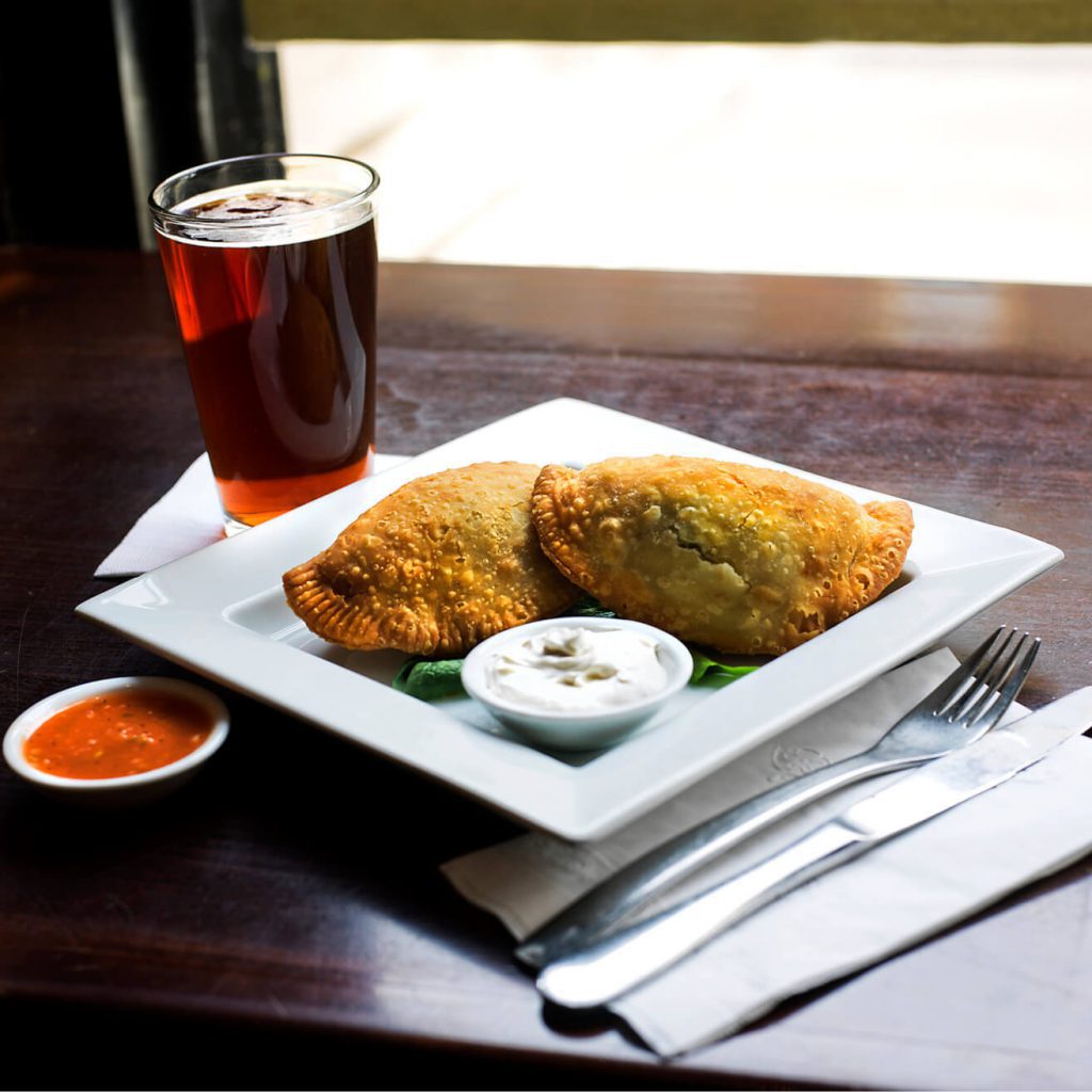 Jamaican Jerk Empanda with housemade seitan and salsa fresca and a Brooklyn  Winter Ale, The V-Spot.