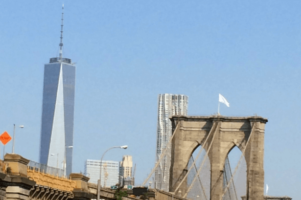 DA Subpoenas Parody Twitter Account, Bike Lobby, Over White Flags On Brooklyn Bridge