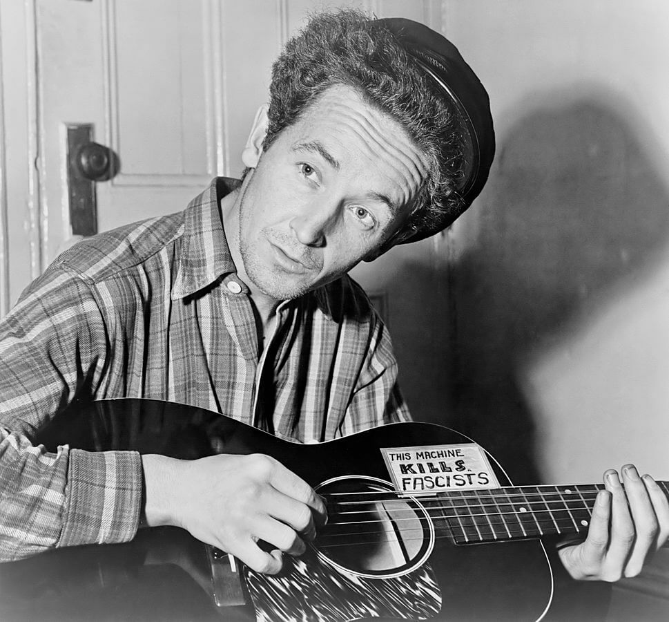 969px-Woody_Guthrie