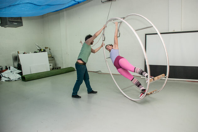 A student gets instruction in a German Wheel class. Photo by Jane Bruce