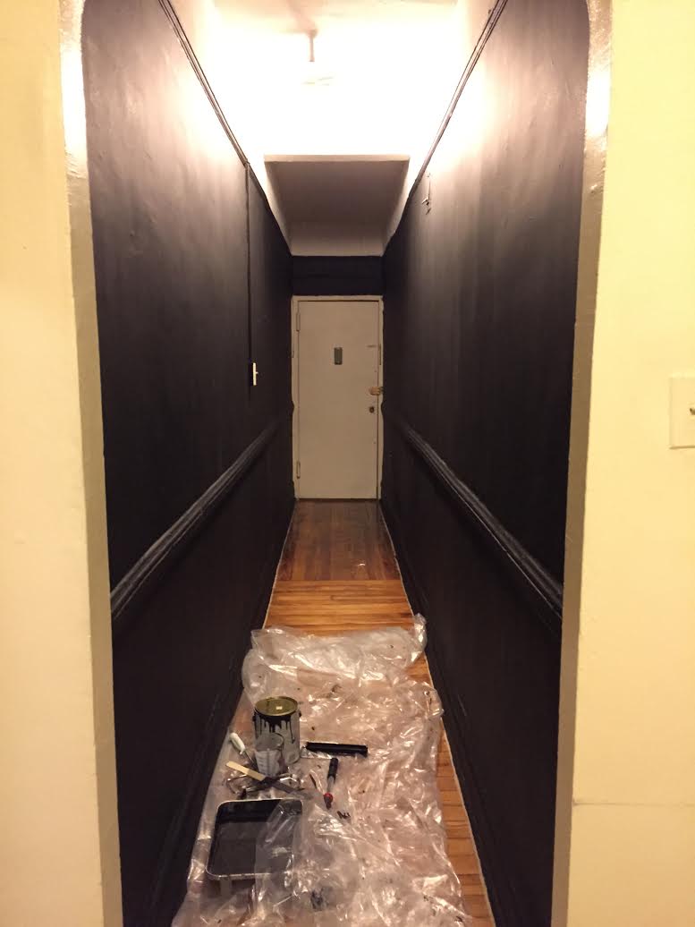 The hallway, now painted black in anticipation of the arrival of the museum's permanent collection. 