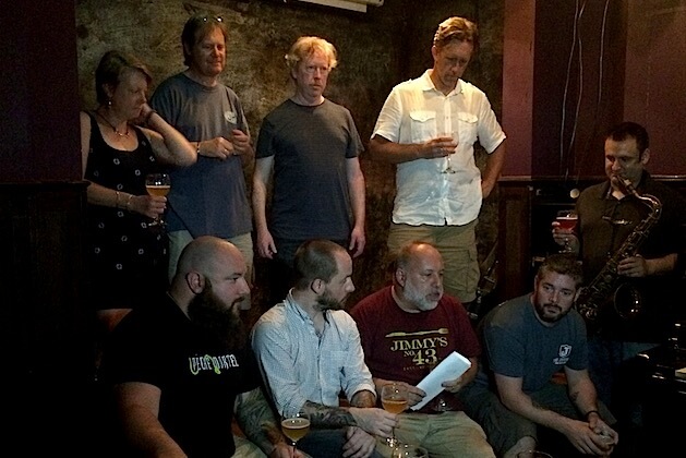 JImmy Carbone, center, shares the winners of the Good Beer Seal last week. Photo by Meredith Heil.