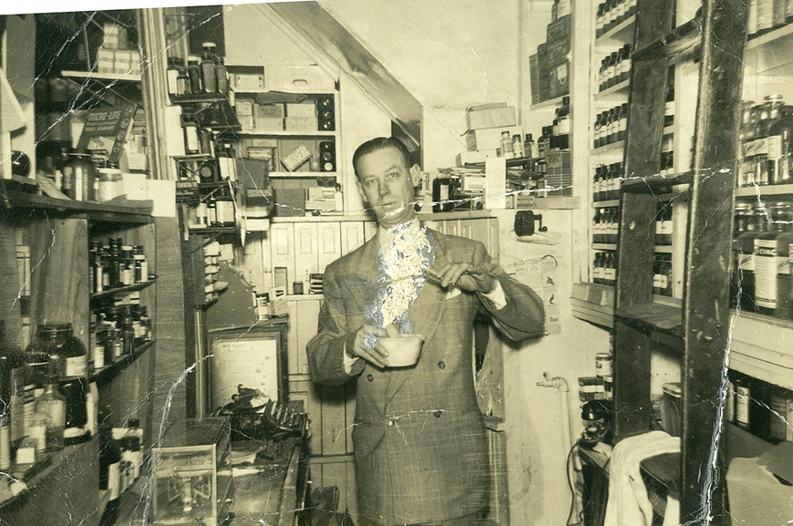 Culture in Transit donor Madeline Lipton’s grandfather Moise Silver standing in Loran’s Drug Store, Brooklyn, 