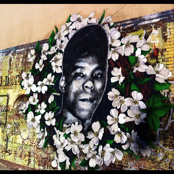 A Bed-Stuy mural of Hawkins' face (via Wikimedia Commons) 
