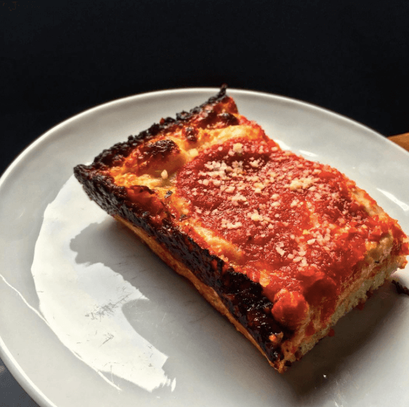 Feast your eyes on that cheesy, crispy, squared crust. (Via Emily Instagram)
