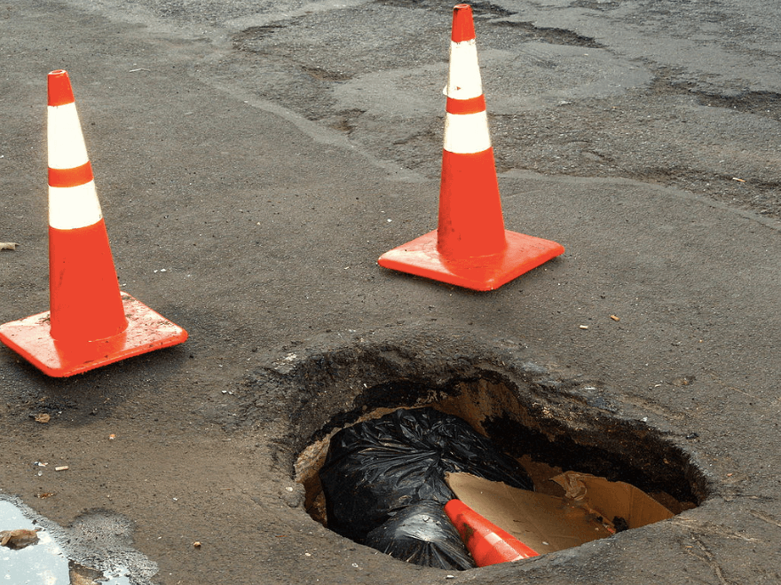 This is a real New York City Pothole that once existed and maybe still does on 2nd Avenue. 