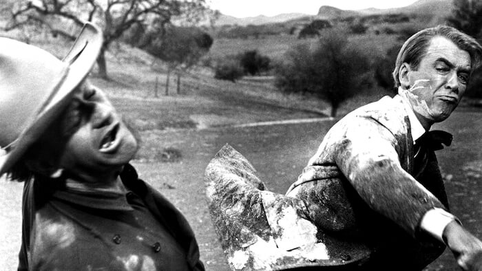  Photo by Everett Collection / Rex Features (415460l) THE MAN WHO SHOT LIBERTY VALANCE, John Wayne, James Stewart, 1962