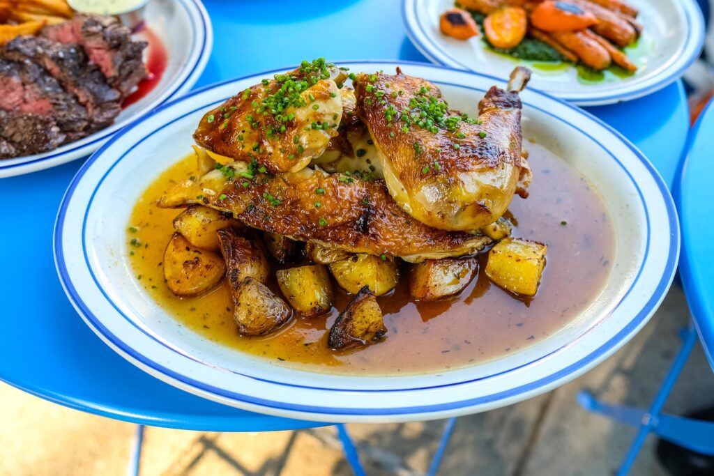 Half roasted chicken with potatoes, $32