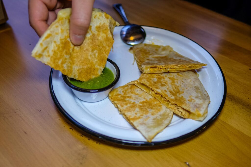 Cheese and chicken quesadilla, $13