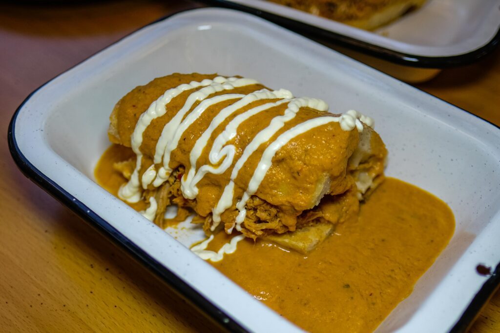 The Macario de panela, a cheese lonche bañado, $16, only half is pictured