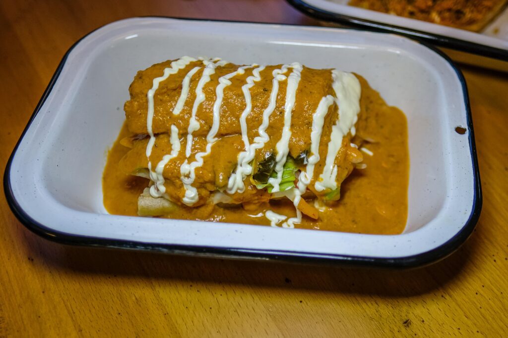 The Macario, a pulled pork lonche bañado, $16, only half is pictured