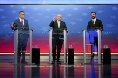 former New York Gov. Andrew Cuomo, Republican candidate Curtis Sliwa and Democratic candidate Zohran Mamdani participate in a mayoral debate.