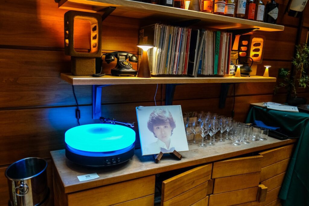 The glowing turntable at Sushi Koju in the Ace Hotel lobby.