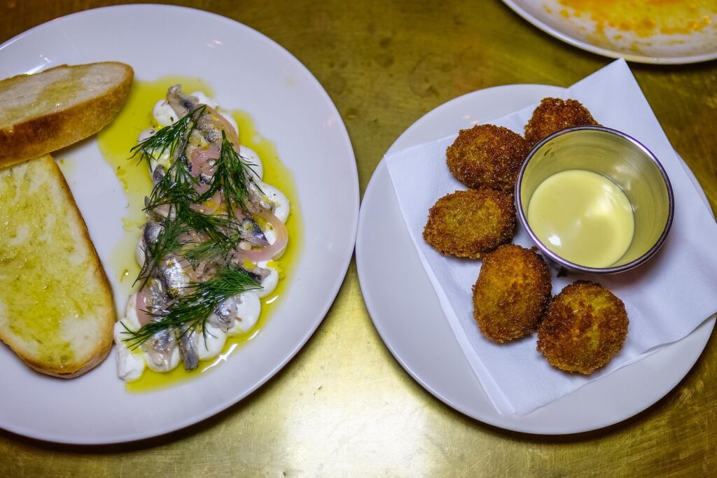 Anchovies on whipped mascarpone, $16; olives ascolane, $18, at Little Grand in East Williamsburg 