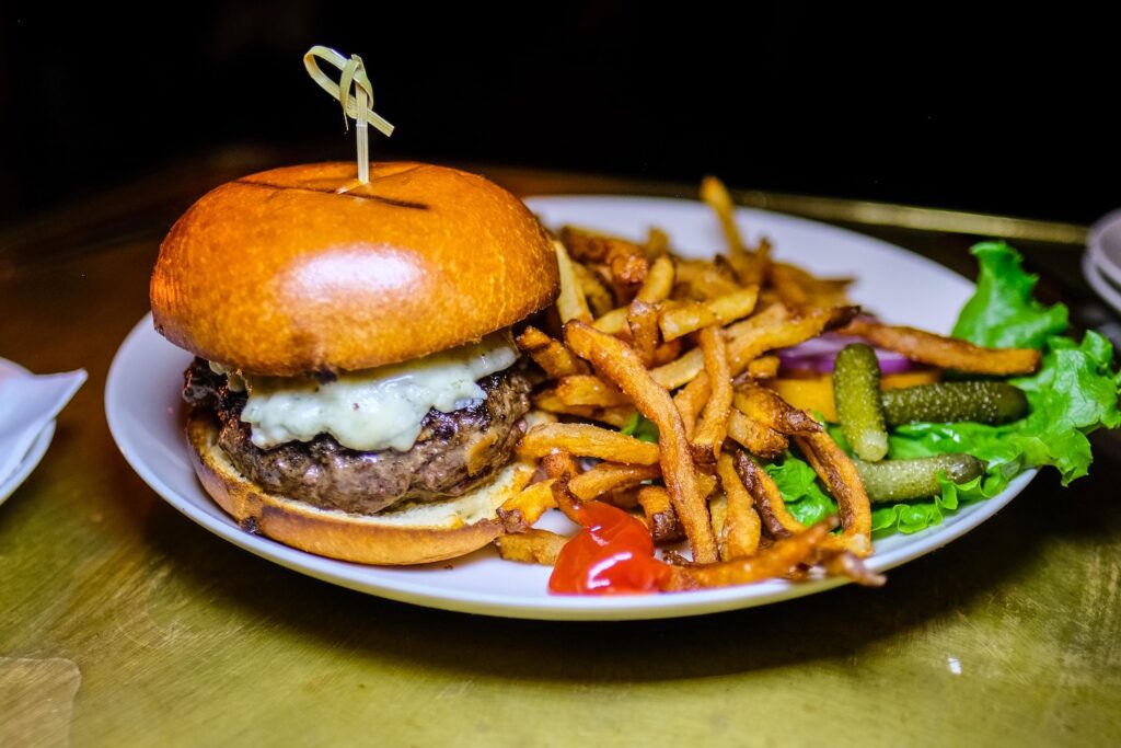 Wagyu burger with blue cheese and fries, $25 at Little Grand in East Williamsburg 