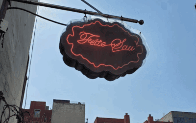 The Fette Sau sign hanging above the entrance to its Williamsburg location.