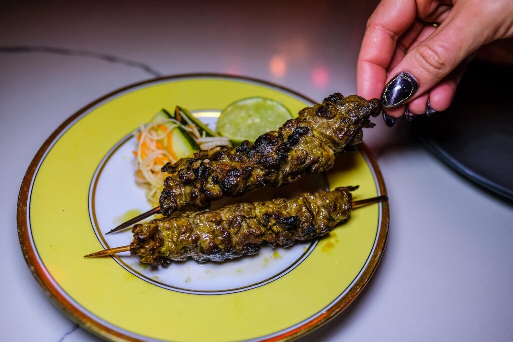 Beef skewers with fish sauce caramel $20, from the Hōp residency at Runner Up in Park Slope, Brooklyn