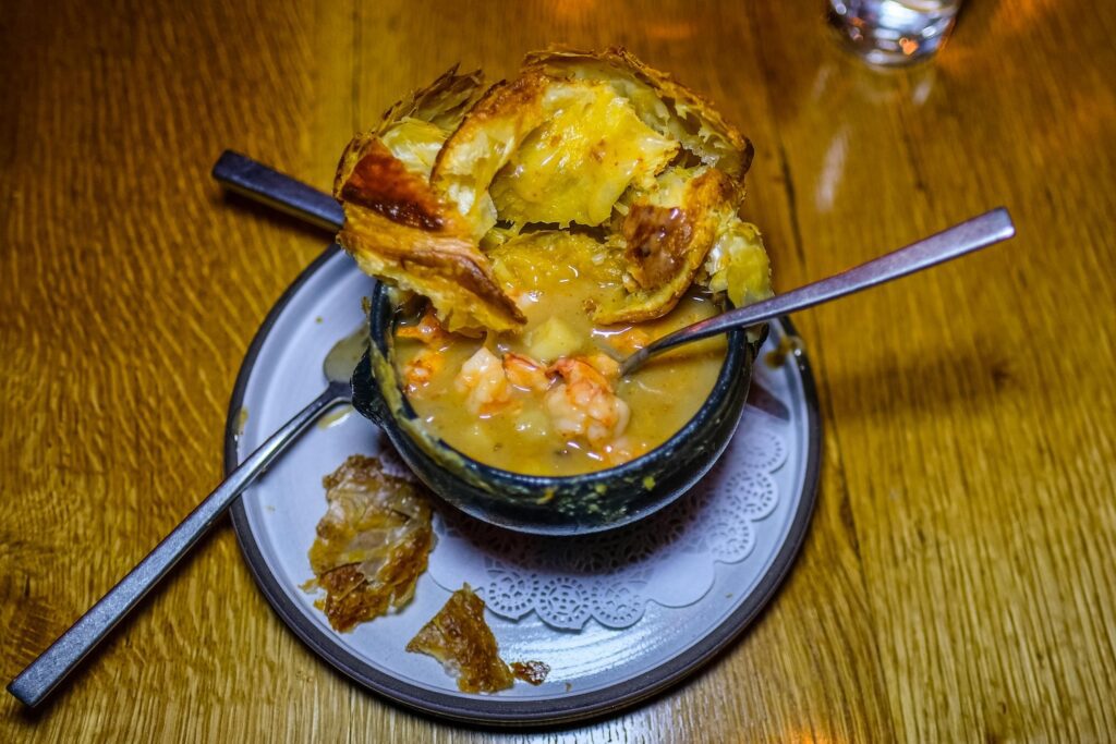 Prawn pot pie after getting torn apart, $34, from Confidant in Brooklyn Heights