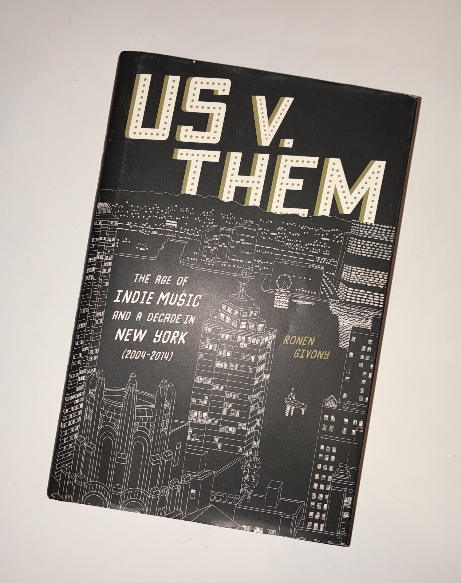 Cover of Ronen Givony's new book, 'Us V. Them: The Age of Indie Music and a Decade in New York (2004-2014)'