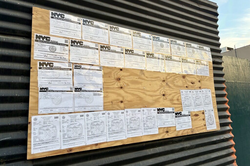 Demolition notices from the Department of Buildings and the Department of Transportation posted outside of Brooklyn Mirage