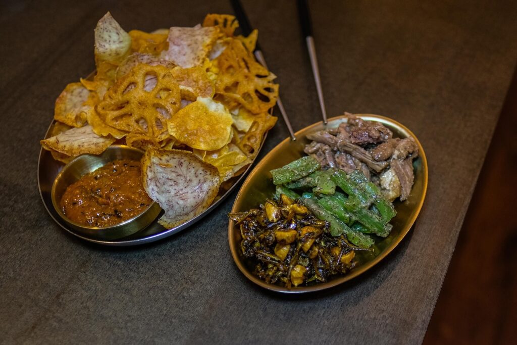 Assorted banchan, $6; root vegetable chips, $7 from Andamiro in Park Slope, Brooklyn