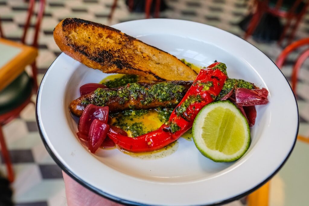 Pork sausage and long hot, $20, at Bodega Nights in Bushwick