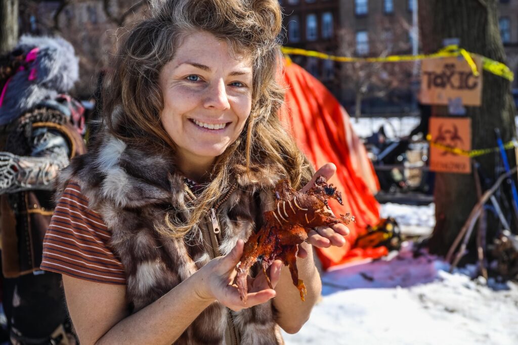 Cathertine Stackpole and her rat jerky at the eighth annual Competitive Winter Picnicking Games in Bed-Stuy, Brooklyn