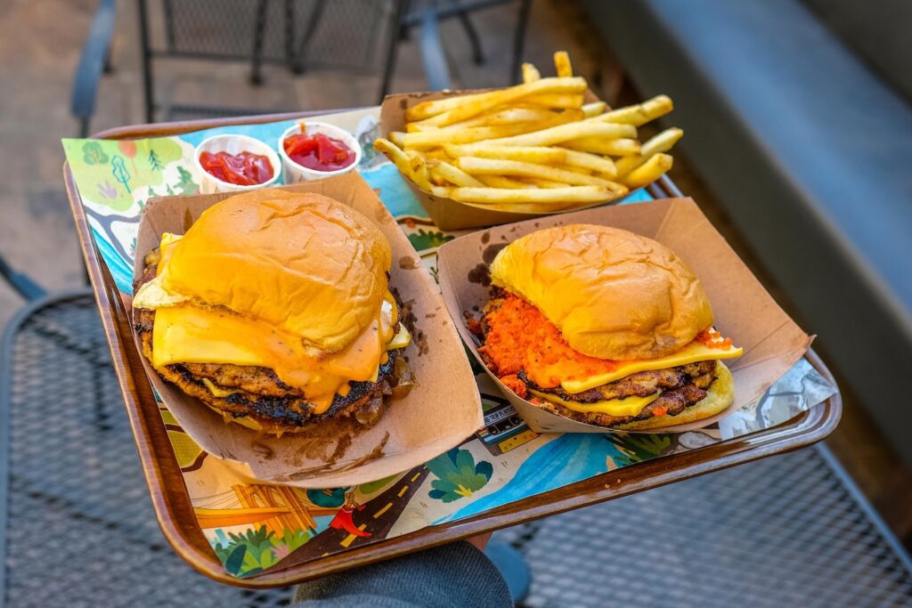 The "OG BK" and "Buffalo Game Day" chicken smashburgers, $11.99 each; fries $4.50, at Ramblin Chick, the new restaurant from the Ample Hills couple, in Carroll Gardens, Brooklyn