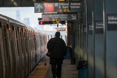 People walk through a Brooklyn subway station after a series of high-profile violent crimes on the transit system on January 08, 2025 in New York City. The New York City subway system, the most extensive mass transit system in the United States, has come under increased scrutiny following the latest incident where a woman was burned to death by a stranger while sleeping, as local authorities struggle to keep the subways safe for an estimated 3.5 million daily riders.