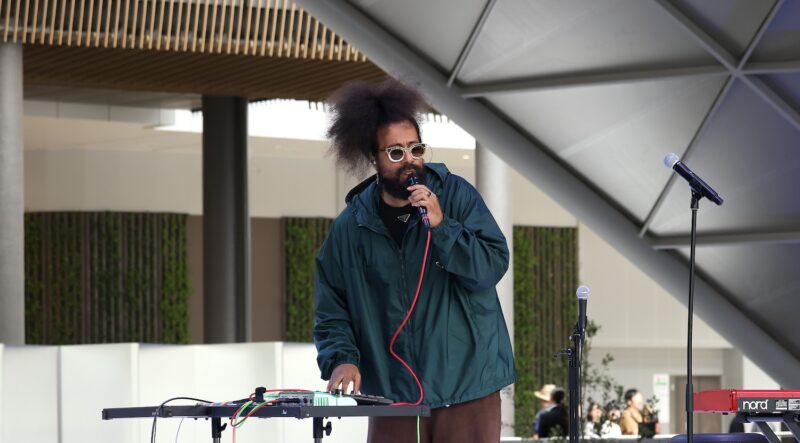 Reggie Watts performs on stage during Prada Mode Osaka at Umekita Park on June 7, 2025 in Osaka, Japan.