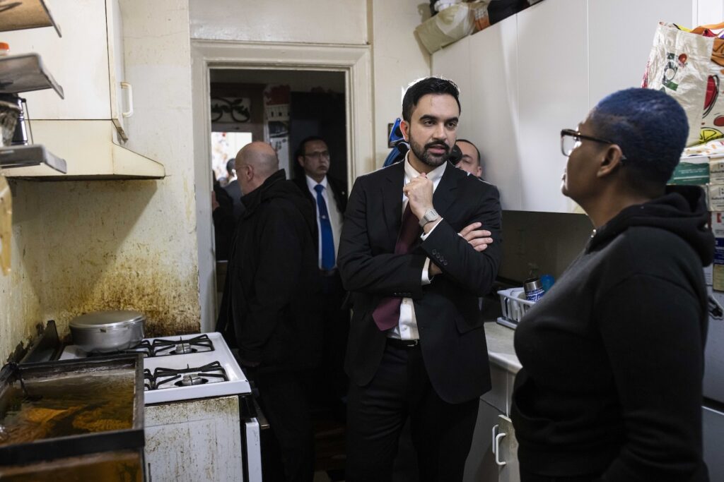 New York City Mayor Zohran Mamdani visits an apartment belonging to Nadege Romulus, right, on his first day in office at 85 Clarkson Ave. in the Prospect Lefferts Garden neighborhood of Brooklyn, Jan. 01, 2026.