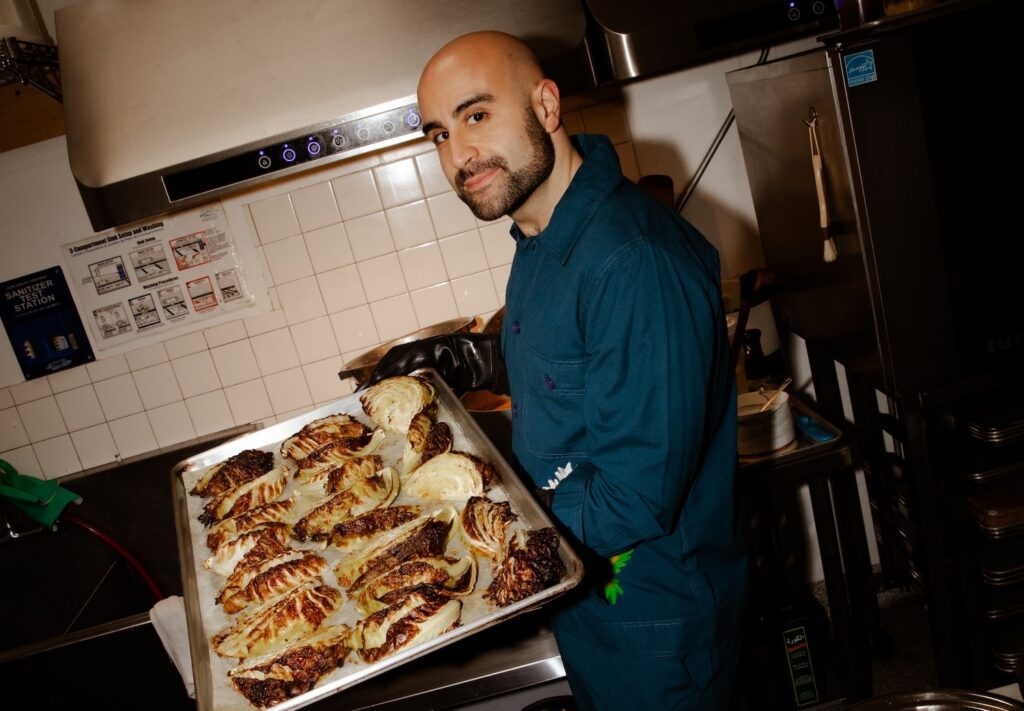Edy Massih of Edy's Grocer in the kitchen