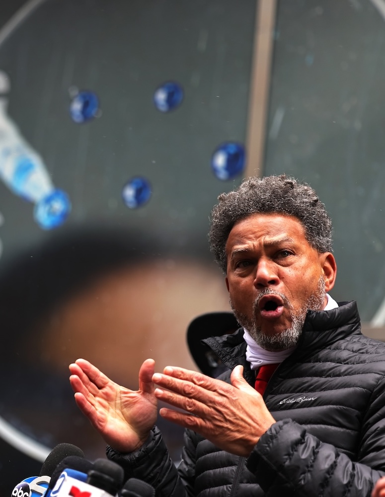 Fernando Mateo speaks during a press conference in front of the Pfizer headquarters in Manhattan on December 09, 2020 in New York City. The New York State Federation of Taxi Drivers is calling on Pfizer to donate 30,000 coronavirus (COVID-19) vaccines to city drivers who have been and will continue to be on the front lines transporting patients to and from vaccine appointments.