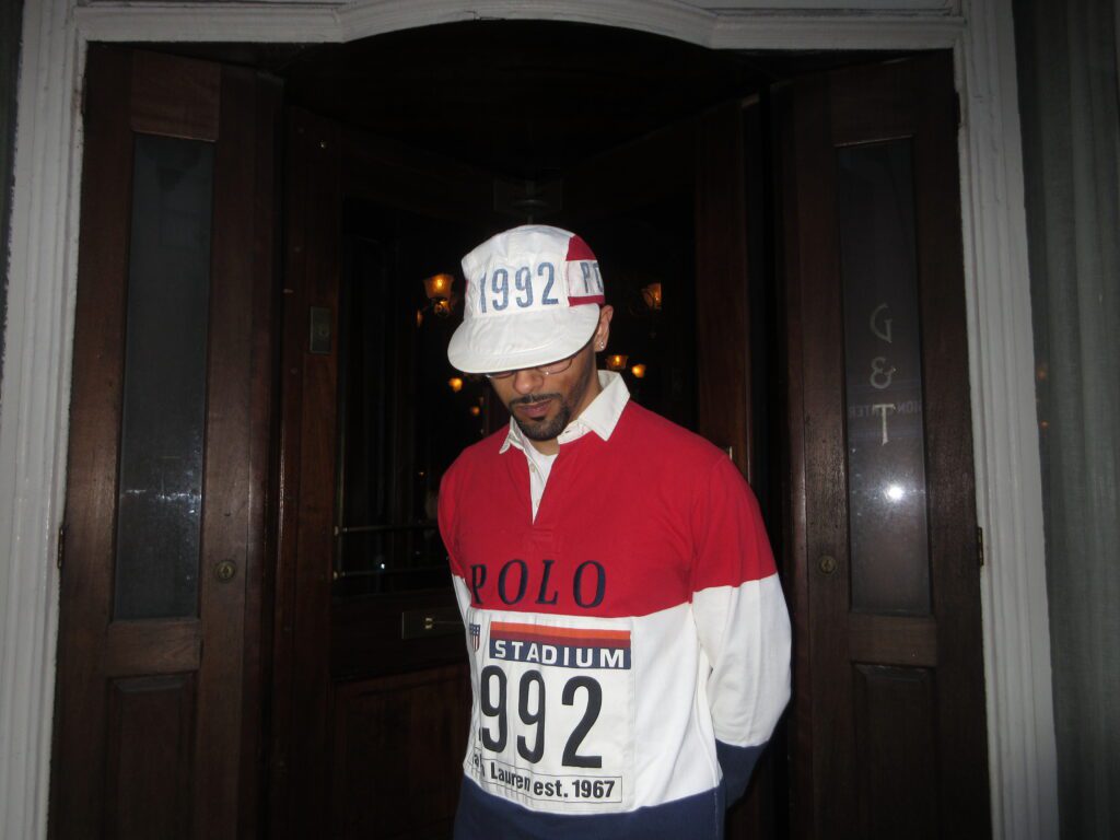 Brooklyn rapper Starker standing in front of Gage & Tolner in Downtown Brooklyn.