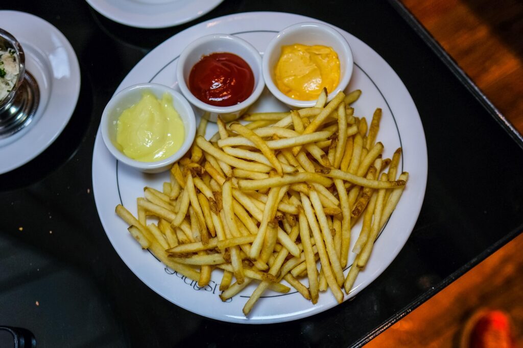 French fries with "all the sauces," $14 from Bar Susanne in Williamsburg, Brooklyn 
