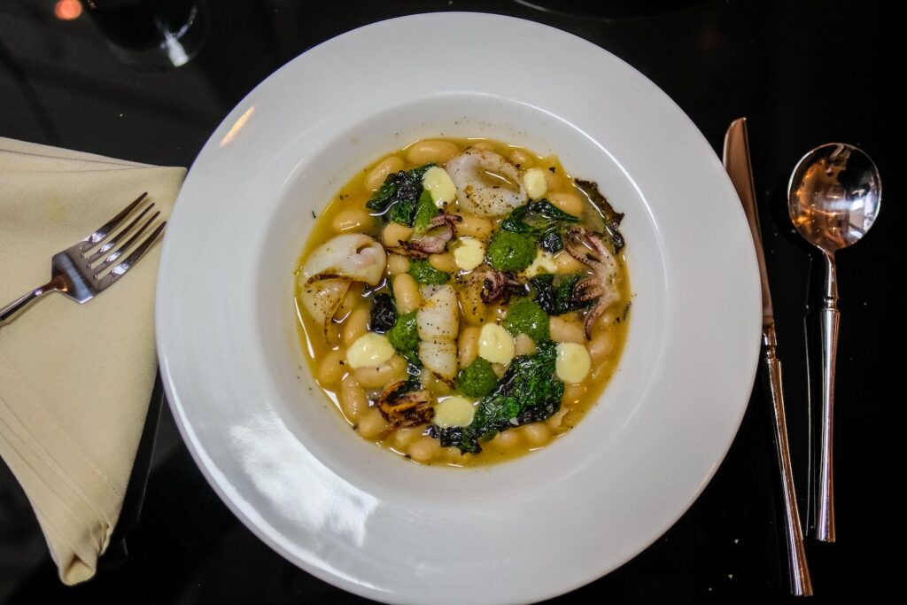 Squid with beans and mustard greens, $29 from Bar Susanne in Williamsburg, Brooklyn 