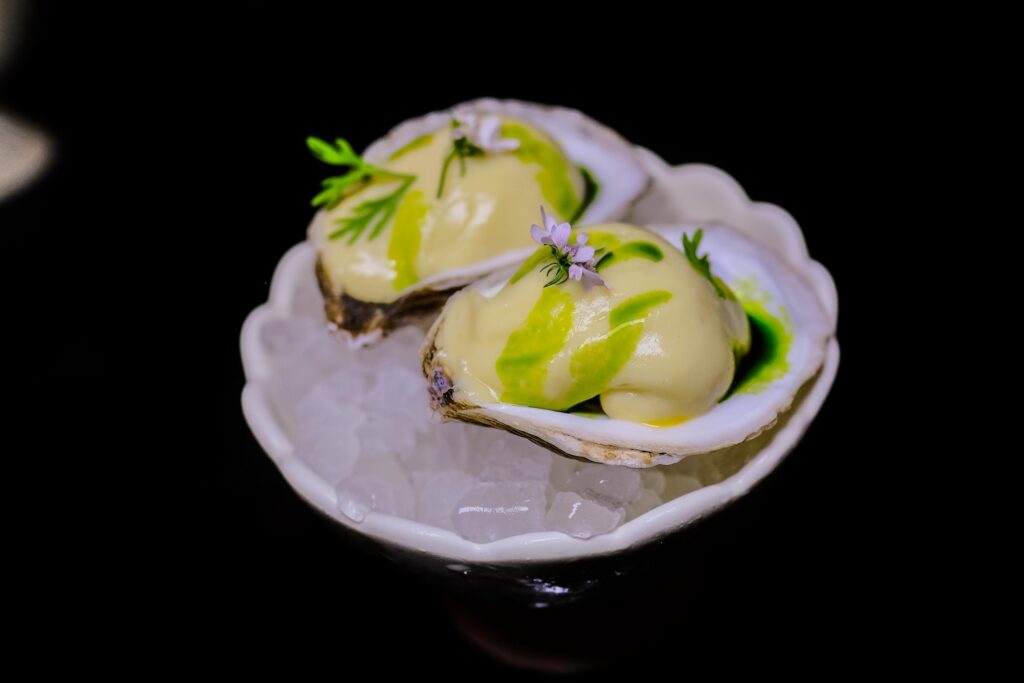 Mango sorbet "oyster shooters," $10 from Bar Susanne in Williamsburg, Brooklyn 