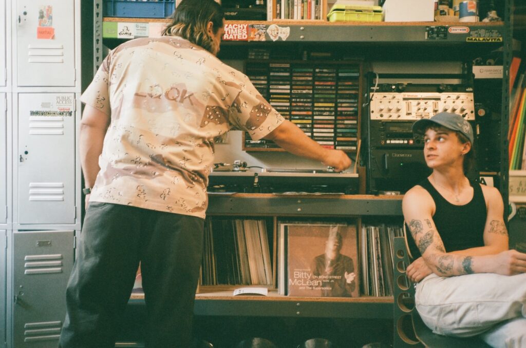 LQQK founder Alex Dondero playing a record in his Bushwick studio