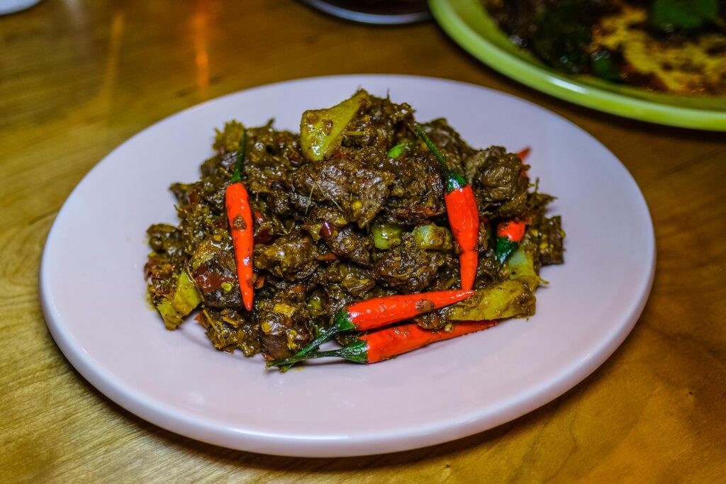 Pad ped of hanger steak and beef tripe from Ugly Baby in Williamsburg, Brooklyn