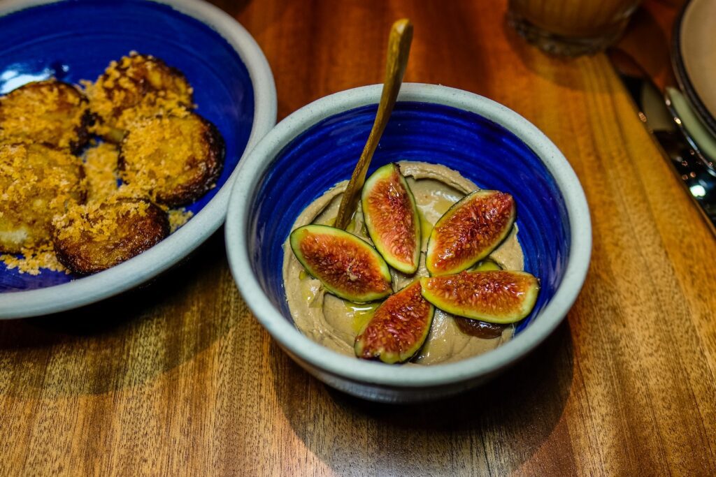 Eeral fry mousse with nei appam and figs, $22, from Top Chef star Rasika Venkatesa's new restaurant Mythily in Williamsburg