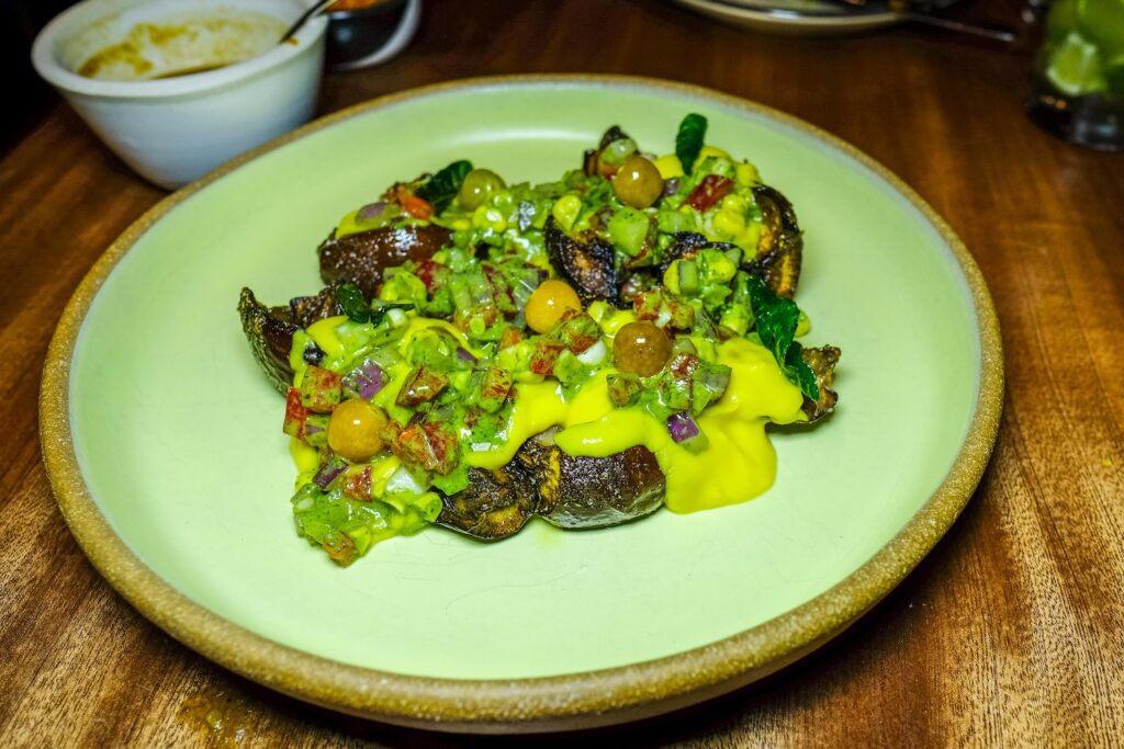 Kathirikkai adaippu curry, $24, from Top Chef star Rasika Venkatesa's new restaurant Mythily in Williamsburg