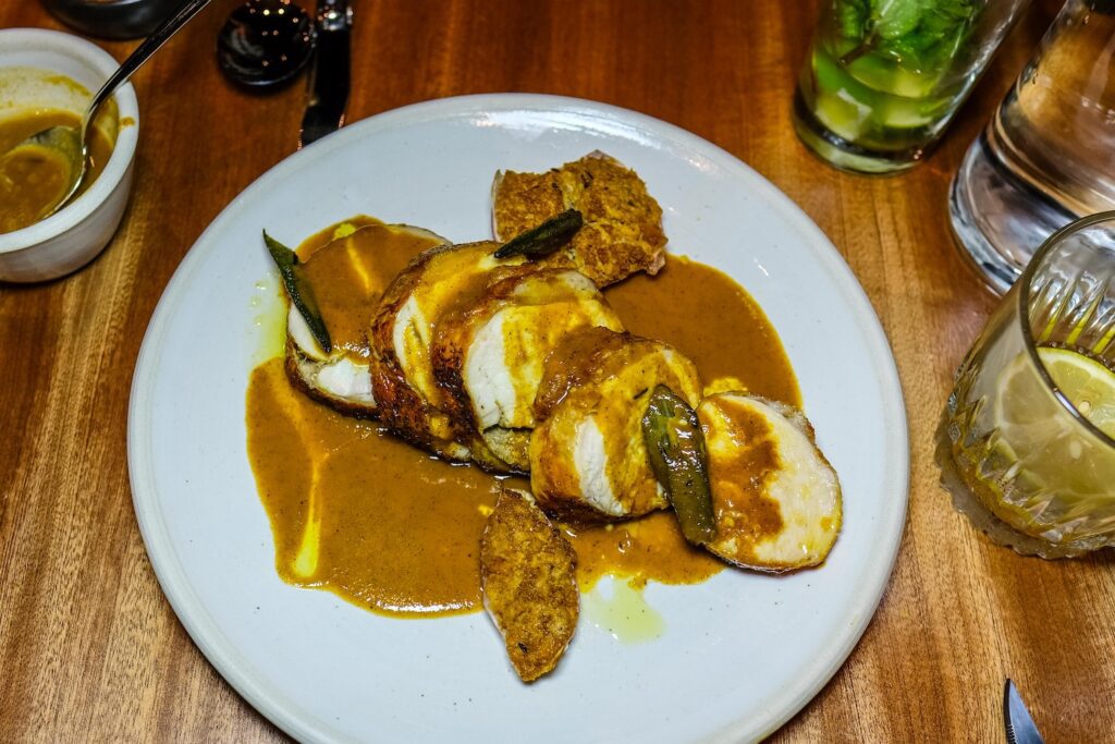 Green circle kozhi ballotine, $38, from Top Chef star Rasika Venkatesa's new restaurant Mythily in Williamsburg