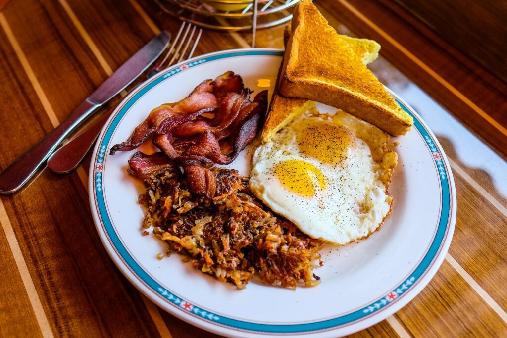 Two eggs with bacon, hash browns, and toast, $13, from Val's Diner in Red Hook, Brooklyn